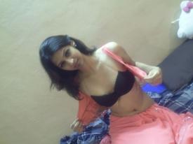Woman opening blouse